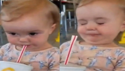 Toddler drinks Coca-Cola, Her reaction has gone viral