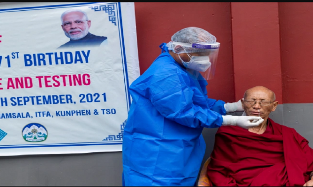 Indian man fined Cut Modi’s face from vaccine drive