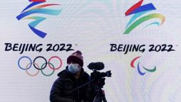 China plans for Beijing Olympic bubble with no holes or hugs