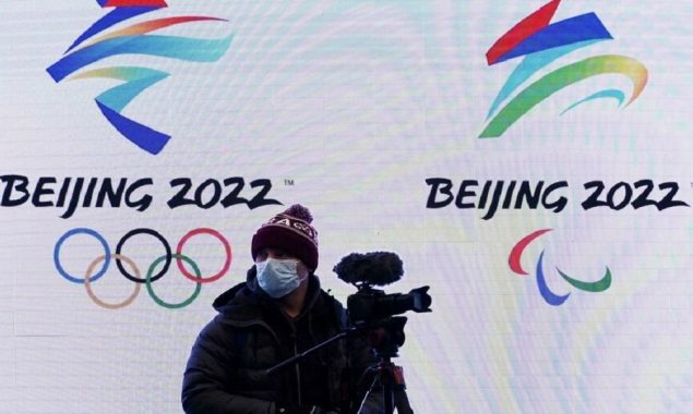 China plans for Beijing Olympic bubble with no holes or hugs