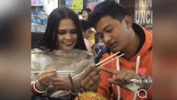 Adorable video: A husband Teaches his Wife How to use Chopsticks