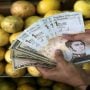 Venezuela creeps out of hyperinflation, but no one feels it