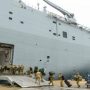 Covid-hit Australian warship delivers disaster aid to Tonga