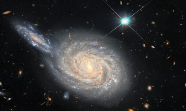 Galactic Conjunction Captured by Hubble Space Telescope