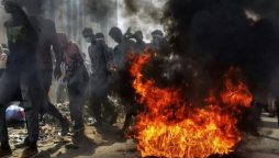 Tear gas and burning tyres as thousands rally in Sudan against the coup