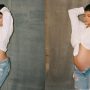 Kylie Jenner shows off her growing baby bump in style