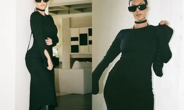 Kourtney Kardashian flaunts her curves in clinging black fitted dress