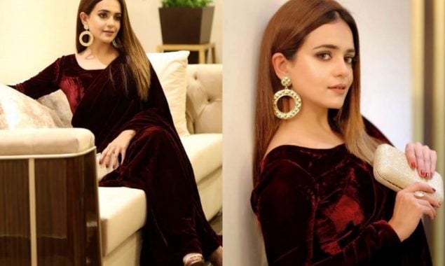 Sumbul Iqbal dazzles in a regal maroon saree, in her latest photographs.