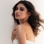Mouni Roy flaunts her svelte figure in an animal print bikini with matching sarong