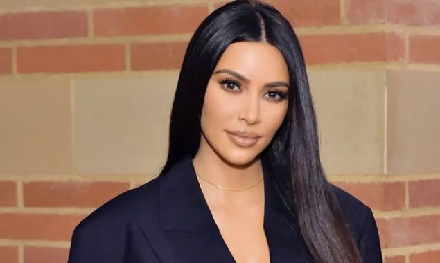 Kim Kardashian is all smiles with her children in her latest Vogue picture