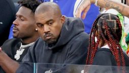 WATCH VIDEO: Kanye West is booed by the Super Bowl audience as he appears on the jumbotron