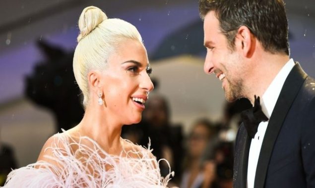 Lady Gaga and Bradley Cooper share a tender moment at the 2022 SAG Awards