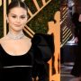 Selena Gomez arrives at the SAG Awards barefoot after tripping on the red carpet
