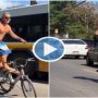 Amazing Stunt: Man pulls with cool bicycle in the middle of the road