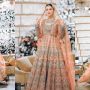 Hania Aamir looks flawless as she twirls in Peach Lehenga