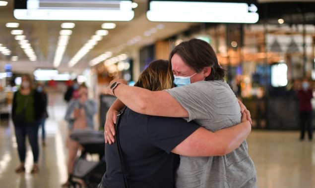 New Zealand opens borders with tears, hugs