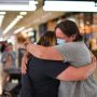 New Zealand opens borders with tears, hugs