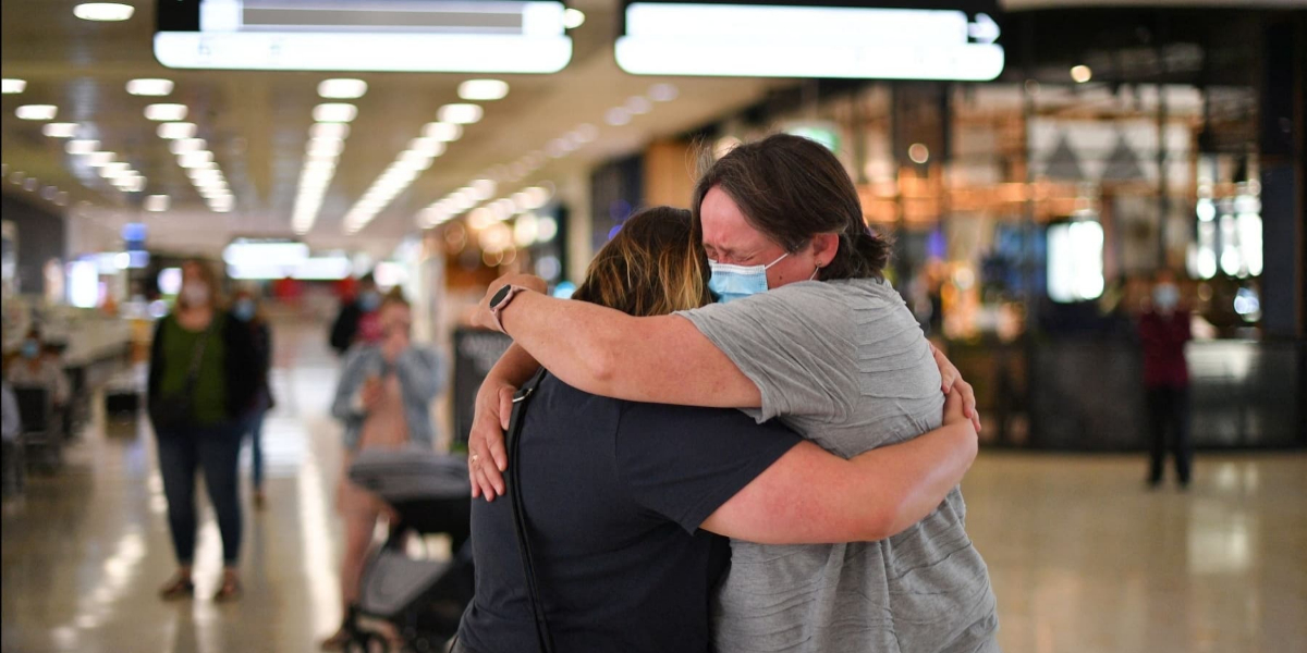 New Zealand opens borders with tears, hugs