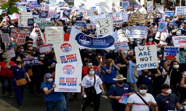 Pandemic-weary Australian nurses go on strike