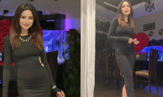 Aima Baig slays in a black ribbed cut-out midi bodycon