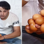 World Record: An Iraqi man balances 18 eggs on back of his hand