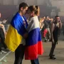 As the Russia-Ukraine crisis worsens, this old photo of a couple wearing two flags goes viral