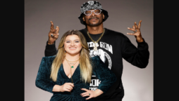 Kelly Clarkson, Snoop Dogg’s faces criticism as they host American Song Contest.