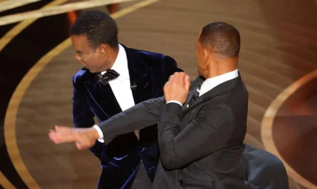Will Smith slpas Chris Rock on the Oscars stage