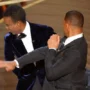 Will Smith slpas Chris Rock on the Oscars stage