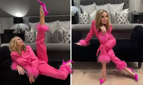 Amanda Holden, 51, dazzles in hot pink heels while posing with one leg above her head