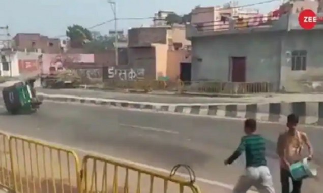 Watch Video: Auto-Rikshaw flips after being hit by a Holi water balloon