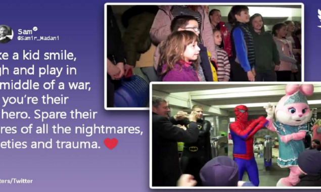 Children are enthralled with superheroes in a Ukraine metro station