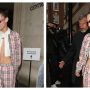 Bella Hadid shows off her toned midriff in a cropped white shirt beneath a pink plaid jacket