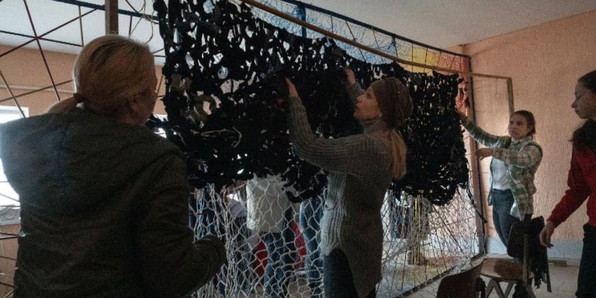 'We're going to stay here.' Women in a small border town refuse to leave Ukraine, saying, "We will fight."