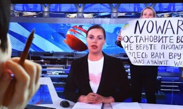 Russian court fines TV protester amid outcry