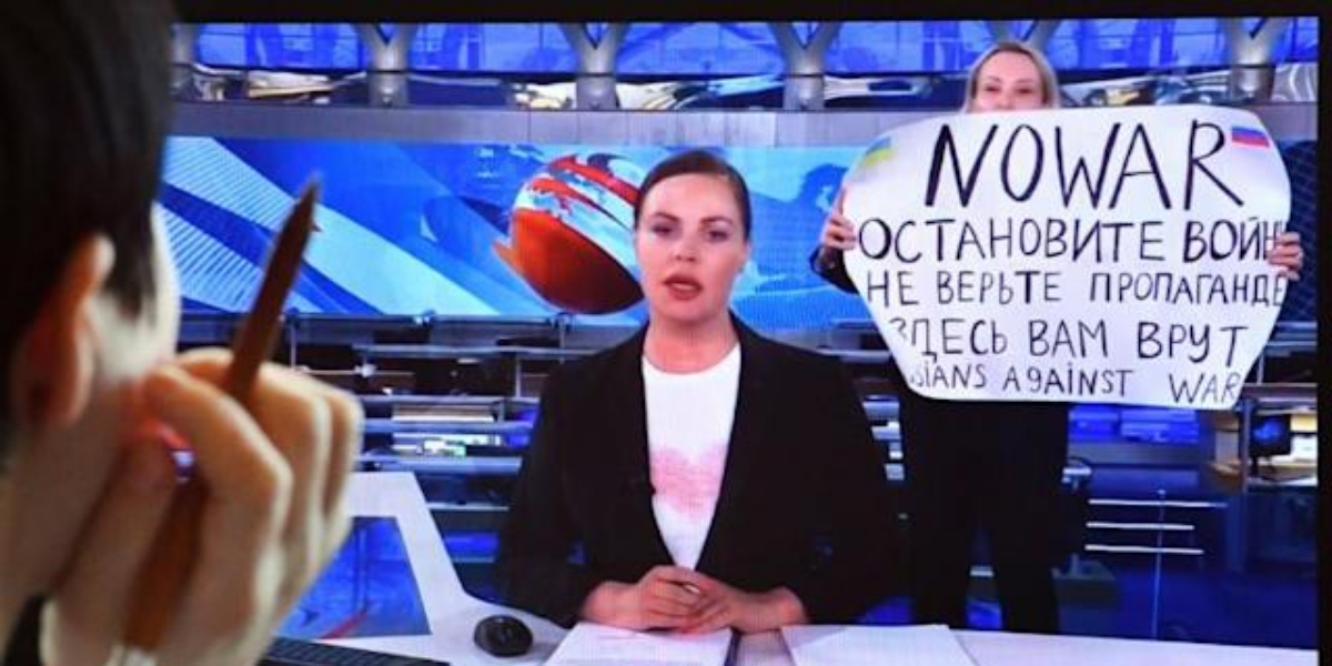 Russian court fines TV protester amid outcry