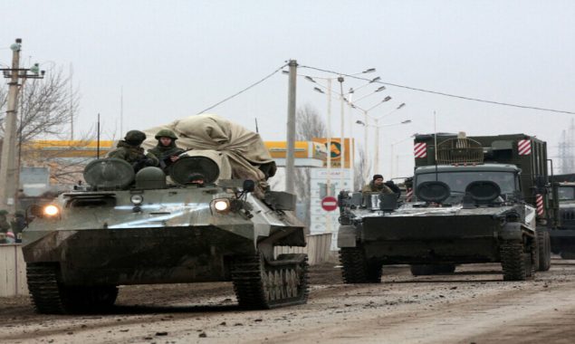 Russian forces squeeze Kyiv, surround Mariupol