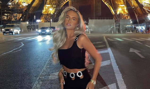 Molly-Mae Hague flaunts her toned tum in a lovely Paris photograph after fueling pregnancy rumours with a bump photo