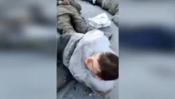 Ukraine will investigate after videos show alleged Russian POWs being shot and abused