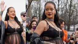 Rihanna flaunts pregnancy curves in this lingerie wear