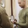 A Ukrainian soldier recieves a medal for his valiant act