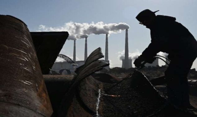 China backpedals on climate promises as economy slows
