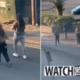 A woman wields a large GUN in broad daylight on a Manchester street, which is shocking
