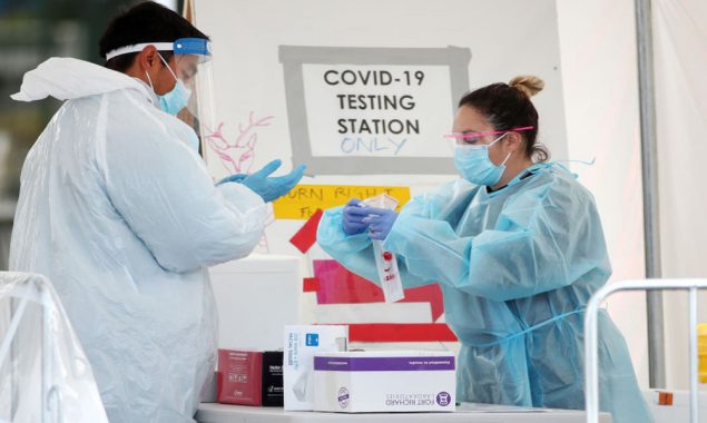 New Zealand reports 11,560 new community cases of Covid-19