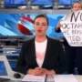 A brave anti-war activist storms Russia’s main propaganda news show, waving a sign that reads, ‘They’re Lying to You.’