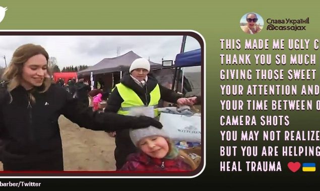 Little girl enters the frame while journalist reports on Ukraine refugee crisis