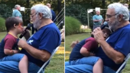 Grandpa sings for his grandson with Down syndrome on his birthday