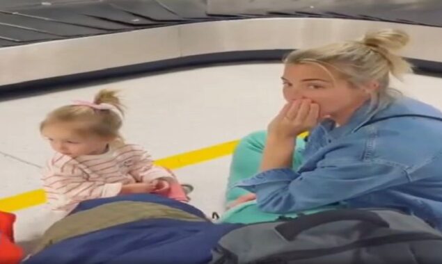 Gemma Atkinson caught up at Manchester Airport as she returns from family vacation