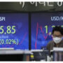 Asian markets slide, China growth behind target