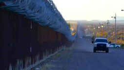 Woman dies after attempting to scale US border wall